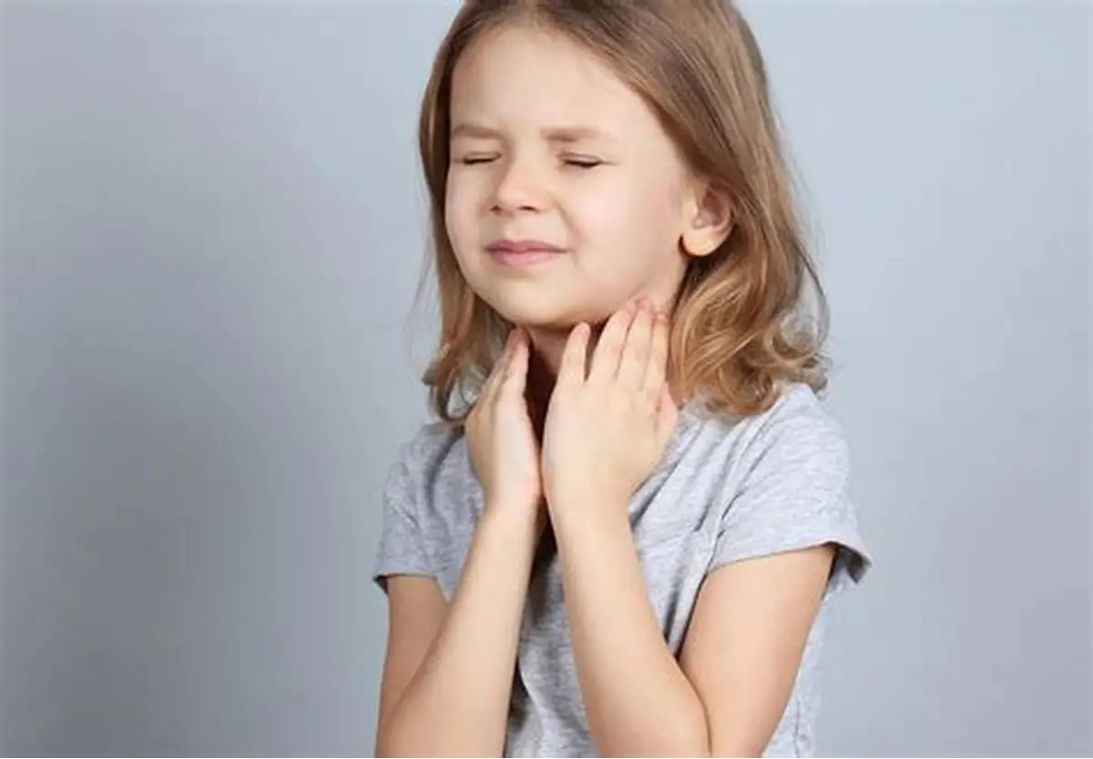 Therapist assisting a patient with safe swallowing support and dysphagia-related rehabilitation during home care.